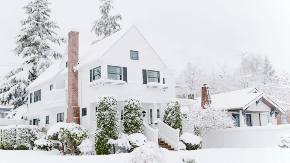 Residential homes covered in winter snow