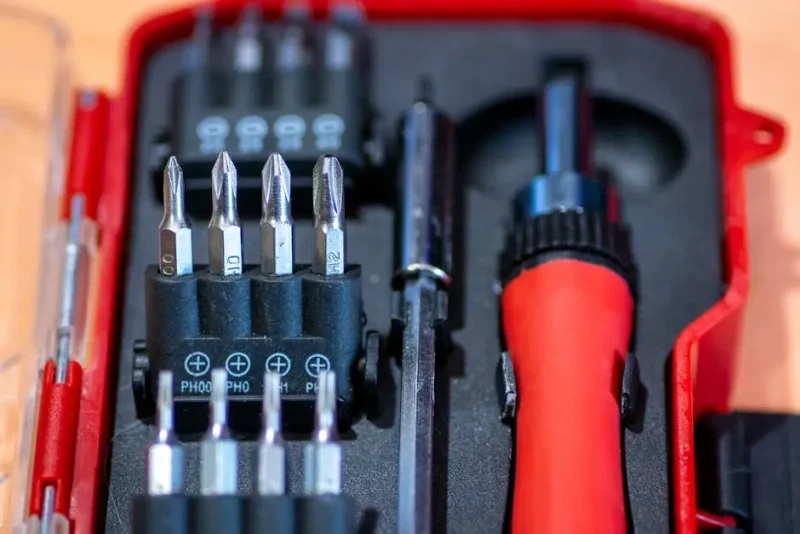 Compact screwdriver and drill bit set for home repairs