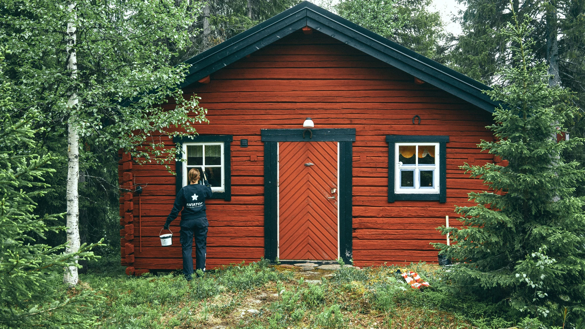 Custom wood playhouse styled like a small cabin